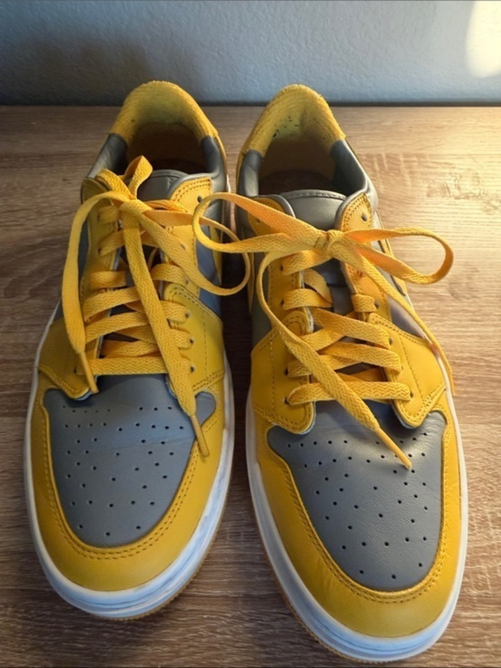 Nike Air Jordan 1 Elevate Low sneakers in the "Cement Grey/Varsity Maize" color